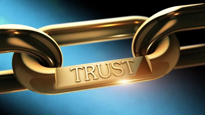 A chain with the word "Trust" on it.