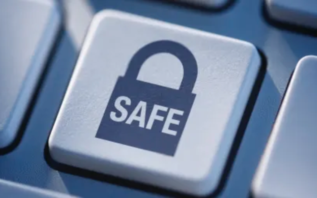 A keyboard button with a lock on it and the words SAFE.